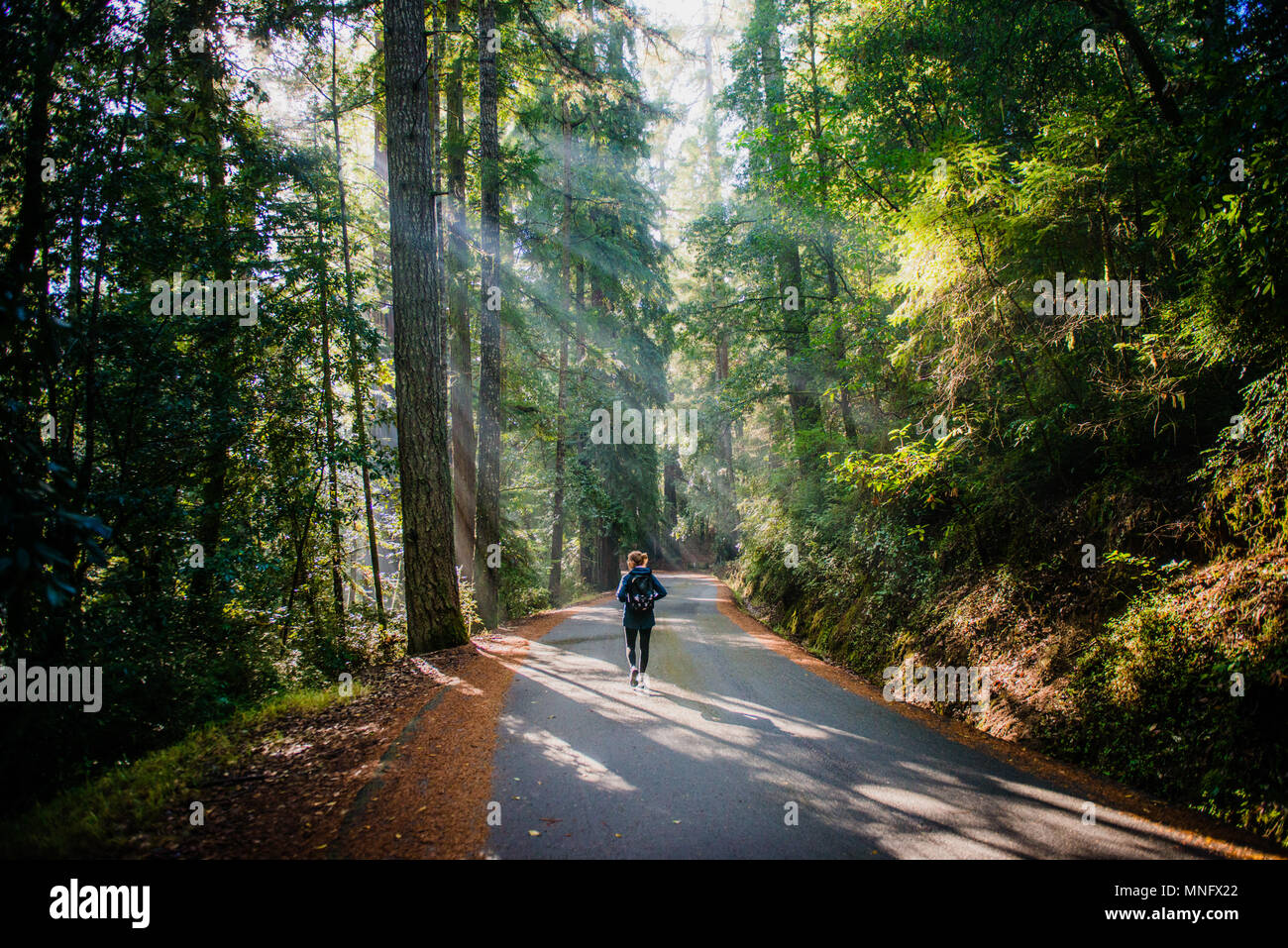 Woman tourist walks among red hi-res stock photography and images - Alamy