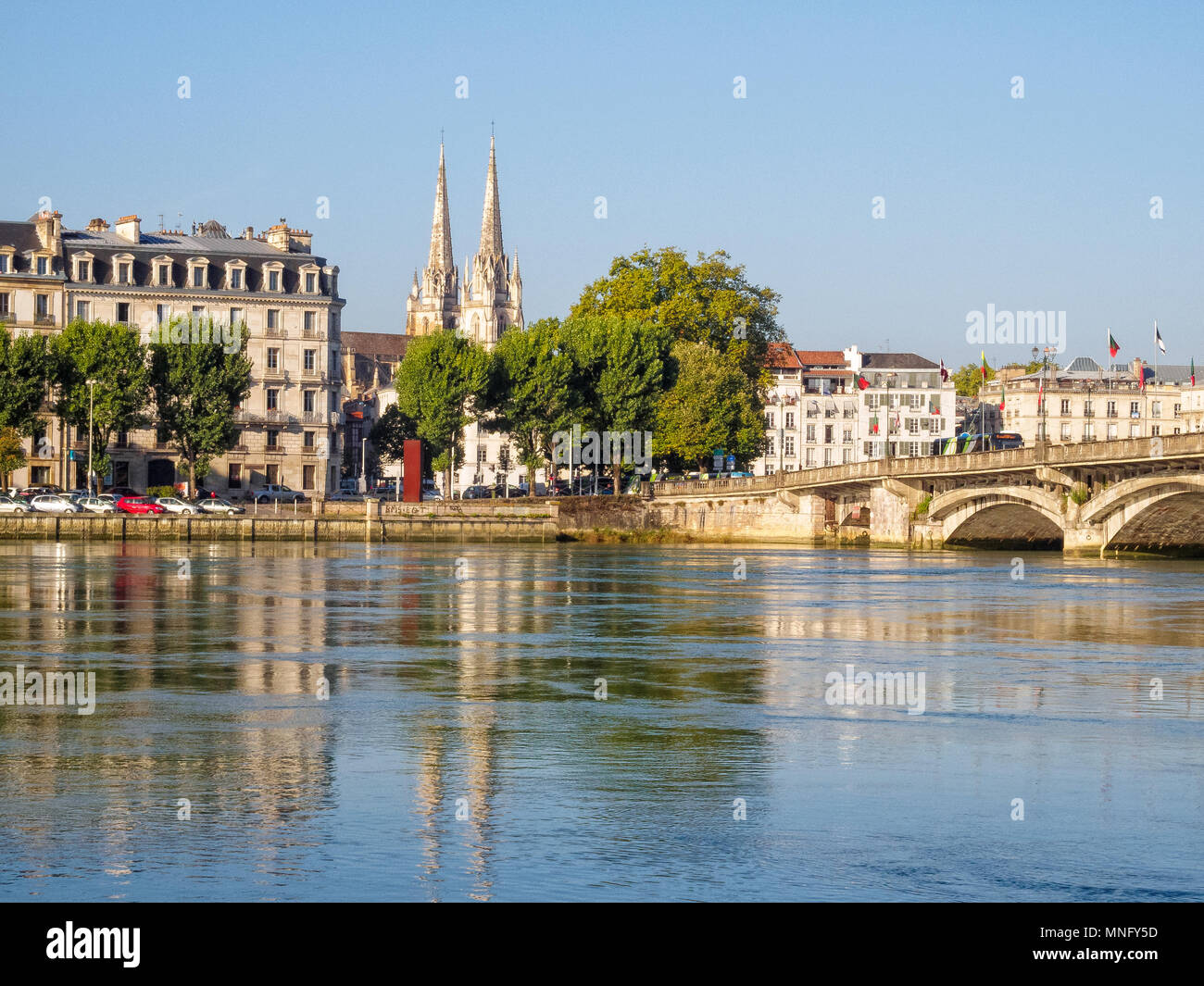 Adour River and the spires of the Cathedral of Saint Mary - Bayonne, France Stock Photo