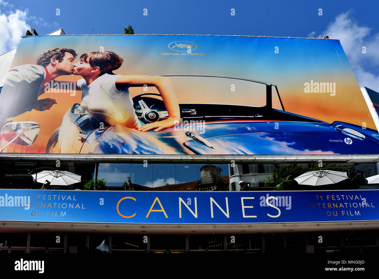 Cannes, France - May 11, 2018:  The poster for the 71st Cannes Film Festival features a scene from the movie Pierrot Le Fou, with Jean-Paul Belmondo a Stock Photo