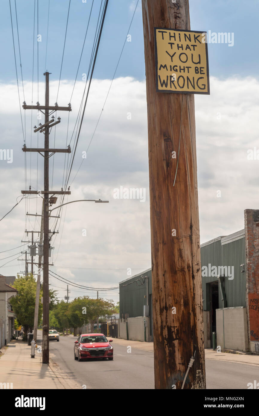New Orleans, Louisiana - A sign on a telephone pole reads: Think That You Might Be Wrong. Stock Photo