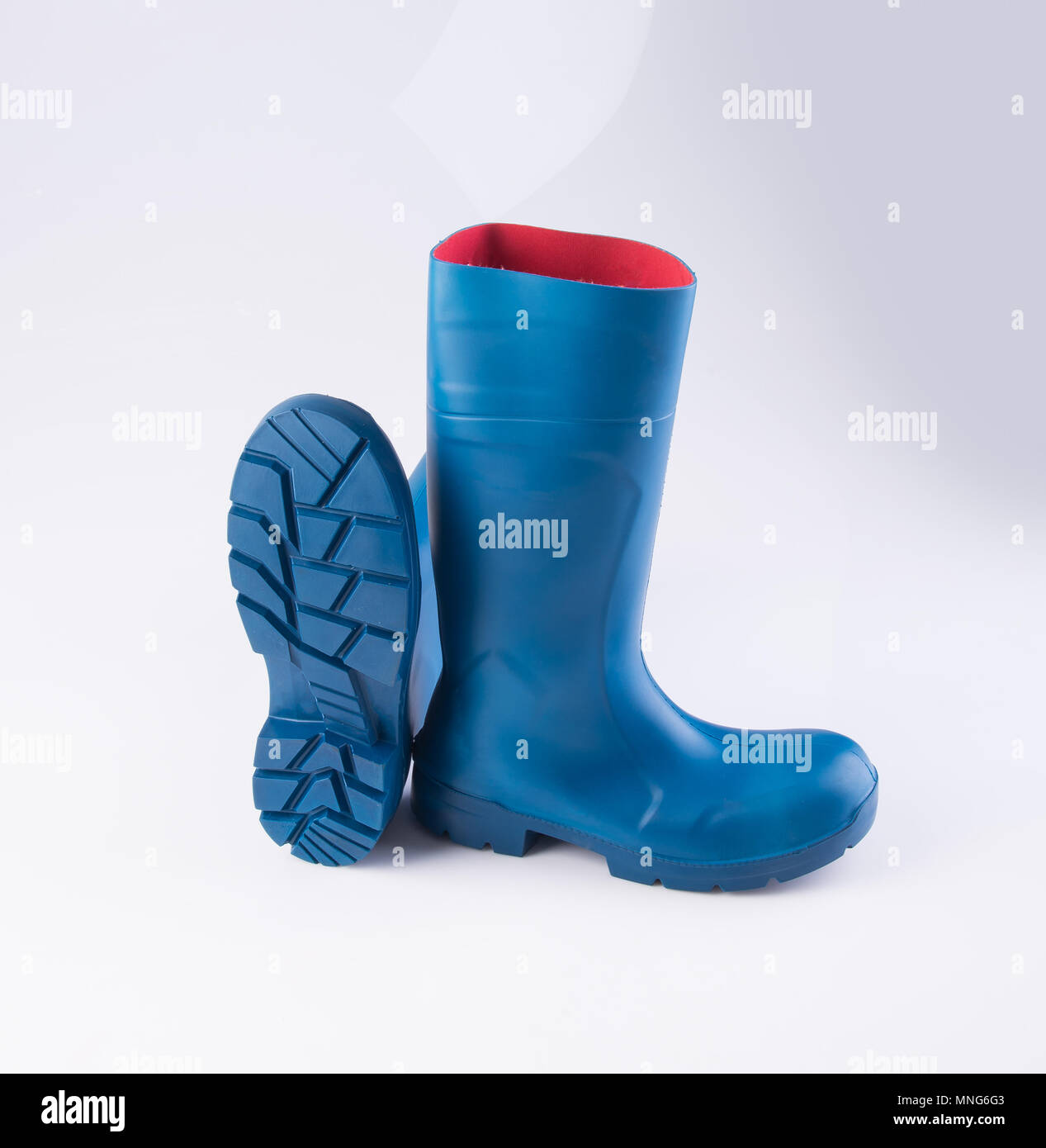 shoe or blue color rubber boots on a background Stock Photo - Alamy