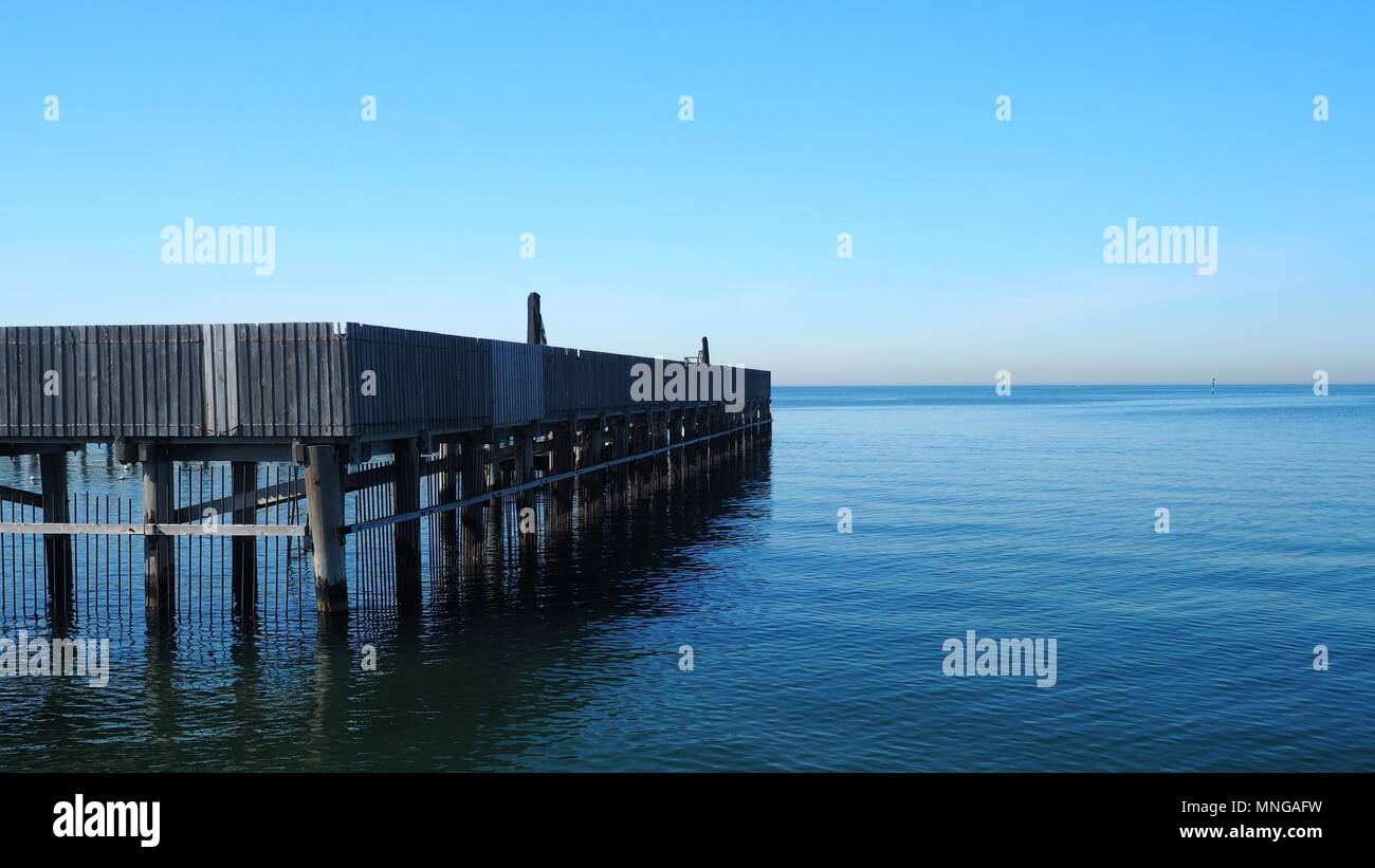 Brighton Baths and still ocean on a blue sky morning, Melbourne, Australia Stock Photo Alamy