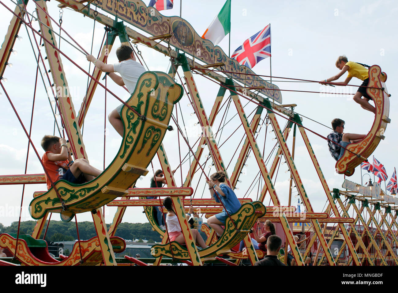 Fair fairground ride swing hires stock photography and images Alamy