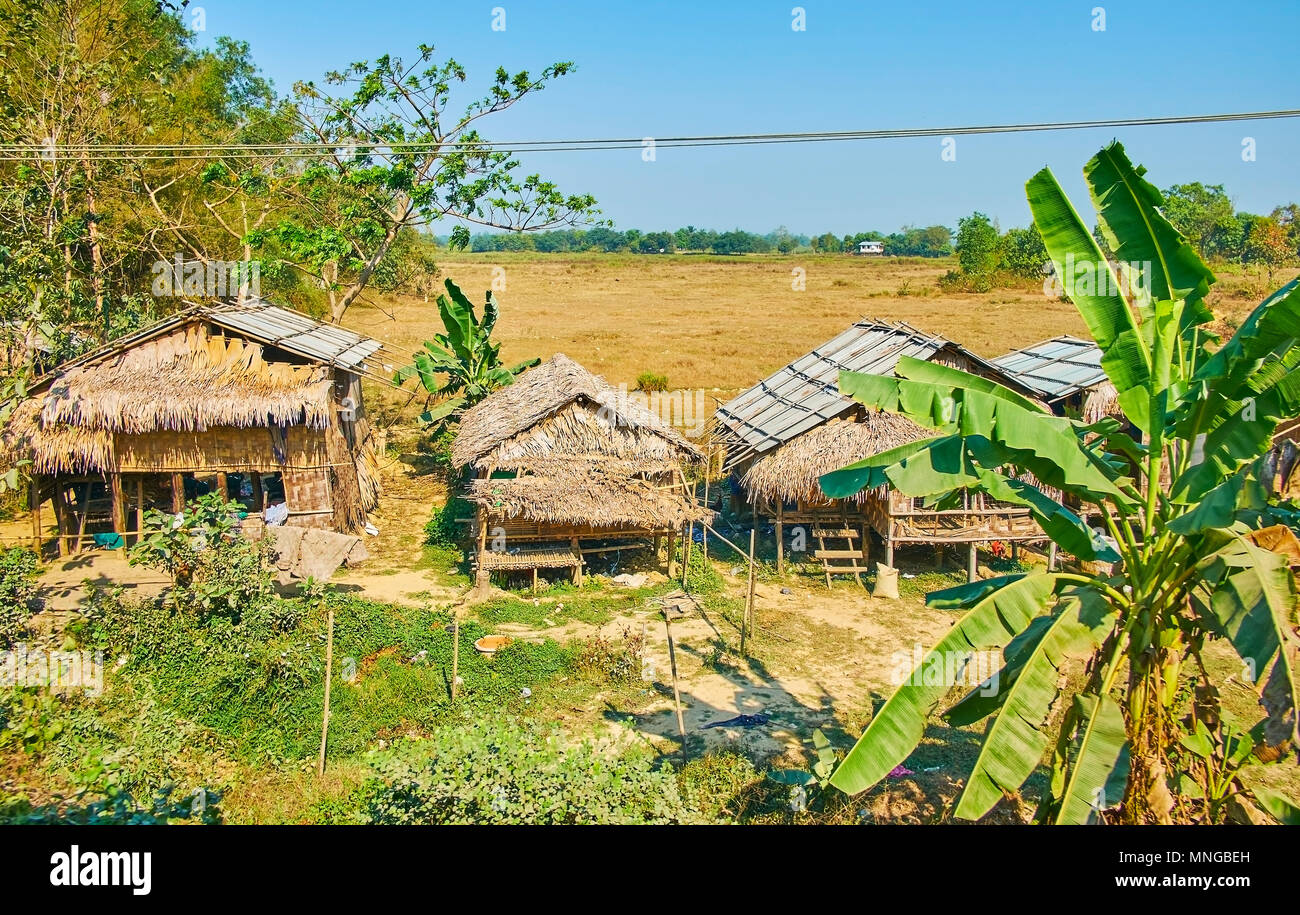 The countryside scene with old bamboo stilt houses, surrounded by