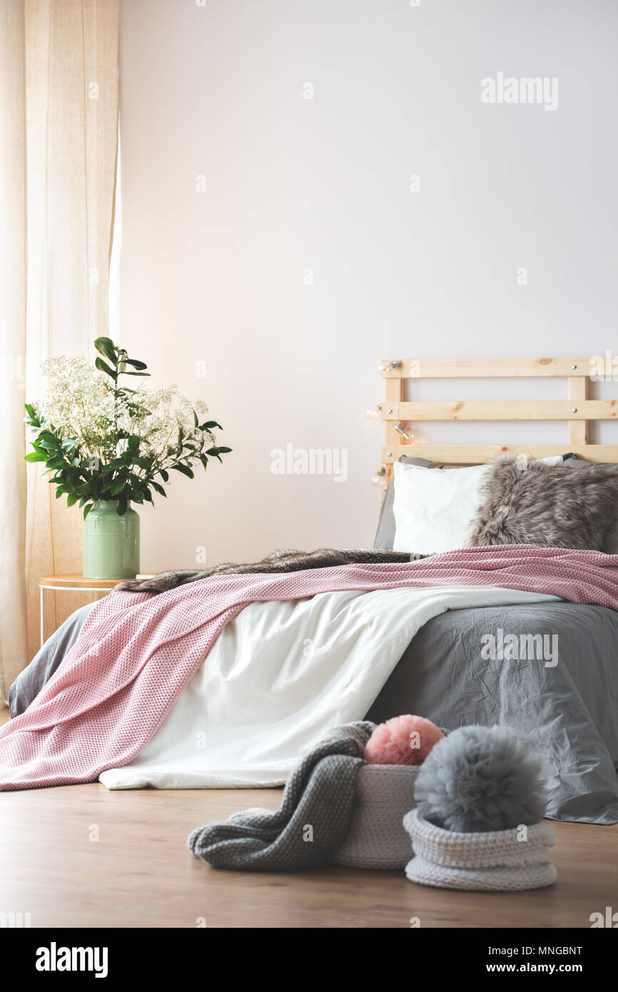 King Size Bed In Modern Bedroom Interior With Flowers On Nightstand Stock Photo Alamy