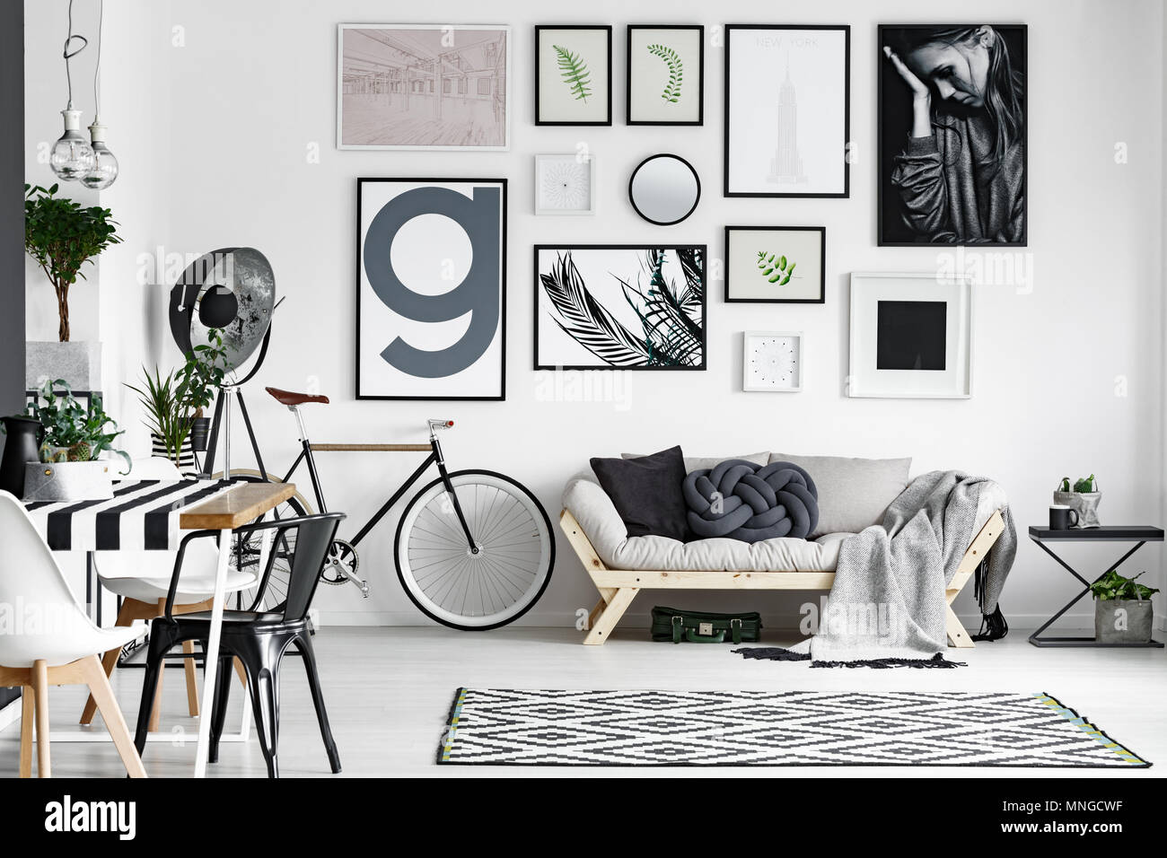 Spacious cozy lounge designed in black and white colors Stock Photo - Alamy