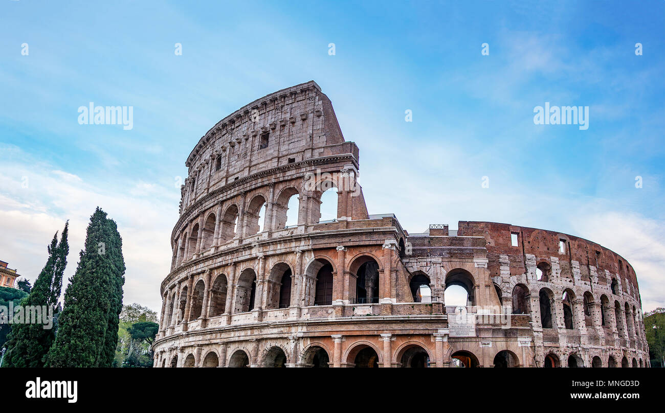 Colosseum at evening. Rome ancient arena of gladiator fights. Rome Colosseum is the best known landmark of Rome and Italy Stock Photo