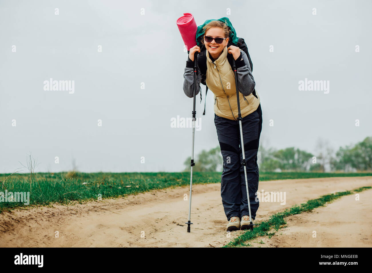 Caucasian woman hiking far from the city Stock Photo