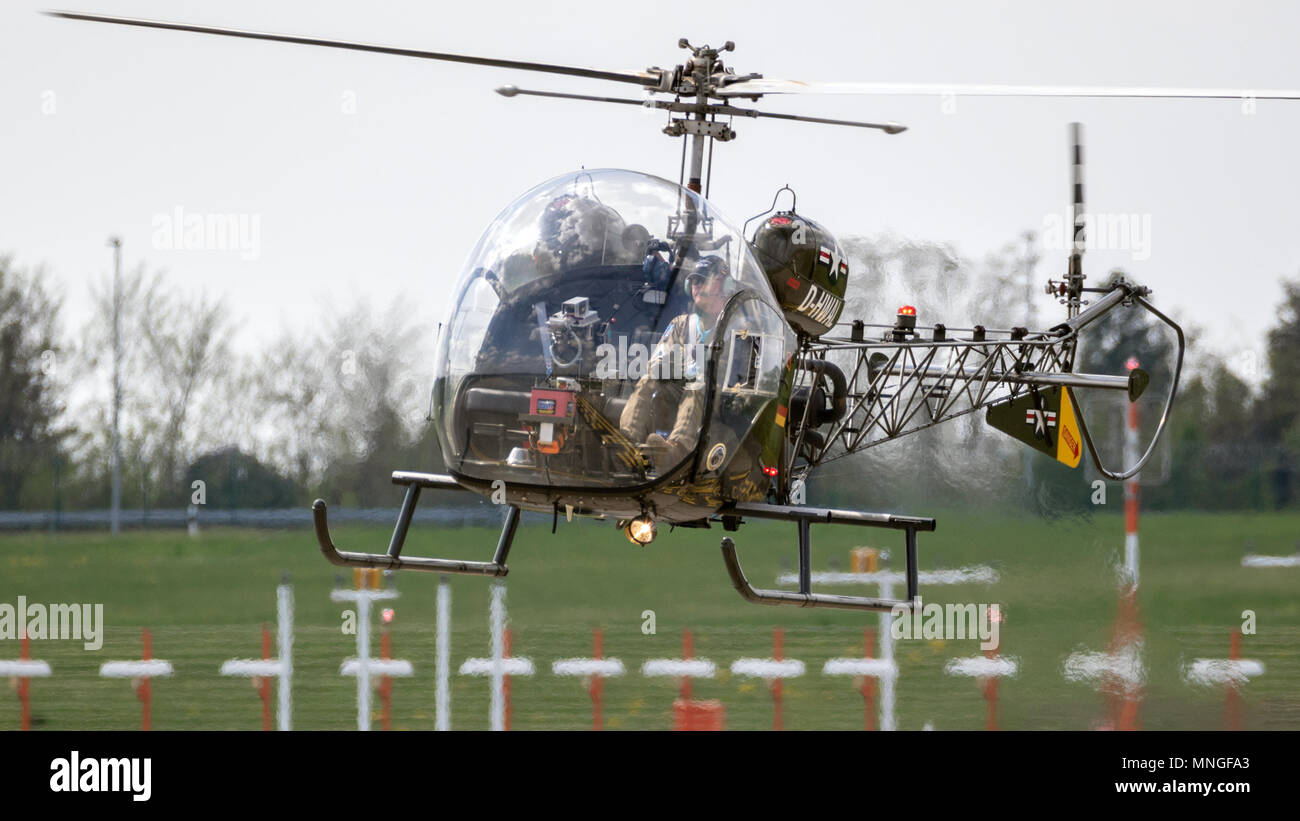 BERLIN, GERMANY - APR 27, 2018: Vintage Bell 47 helicopter in US Army colours performing at the Berlin ILA Air Show. Stock Photo