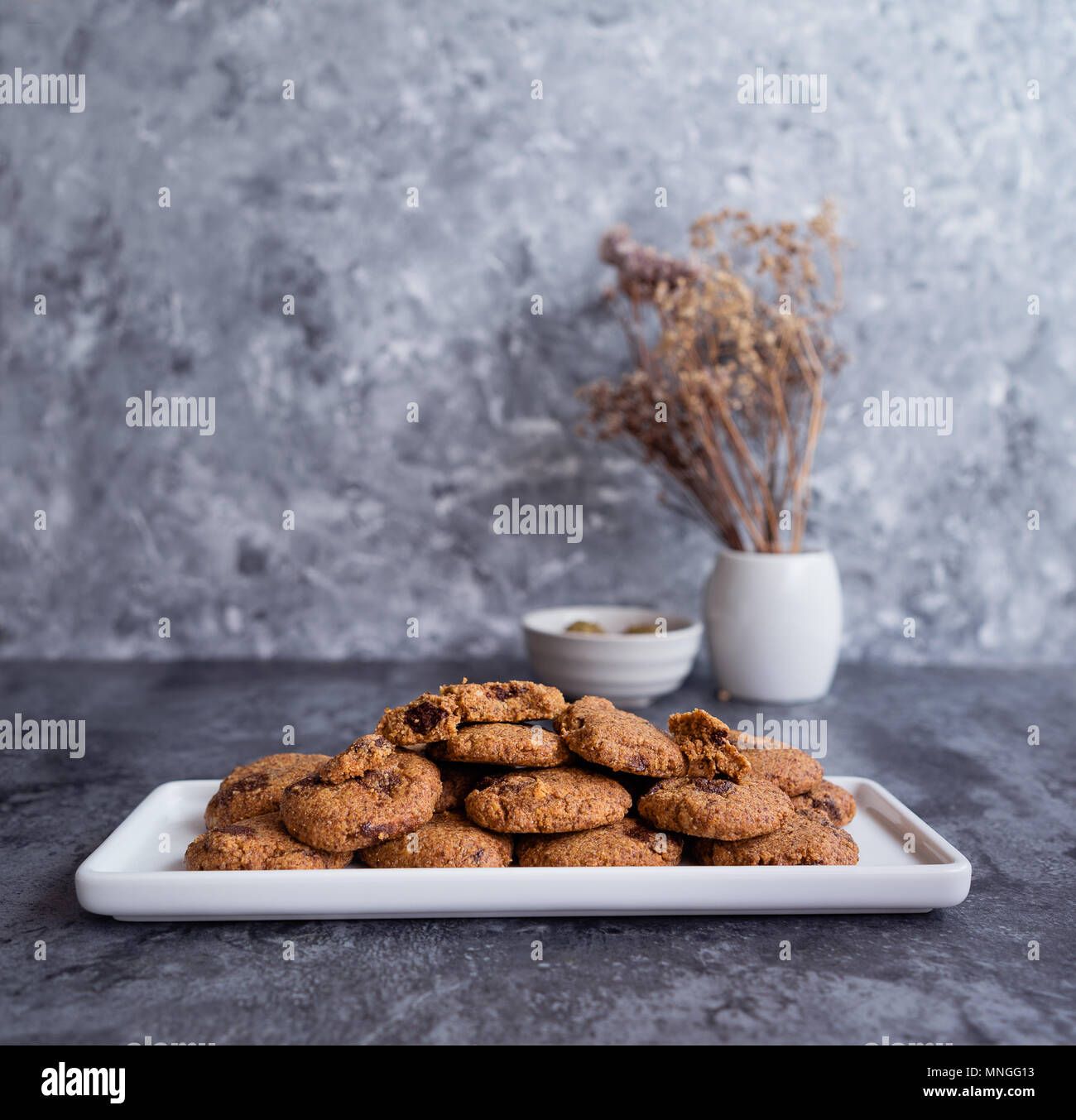 Hazelnut Cookies on a plate, table setting. Stock Photo