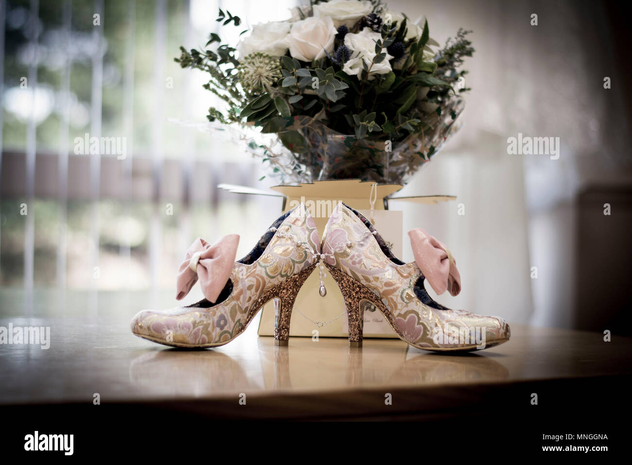 Wedding Shoes & Flowers Stock Photo - Alamy