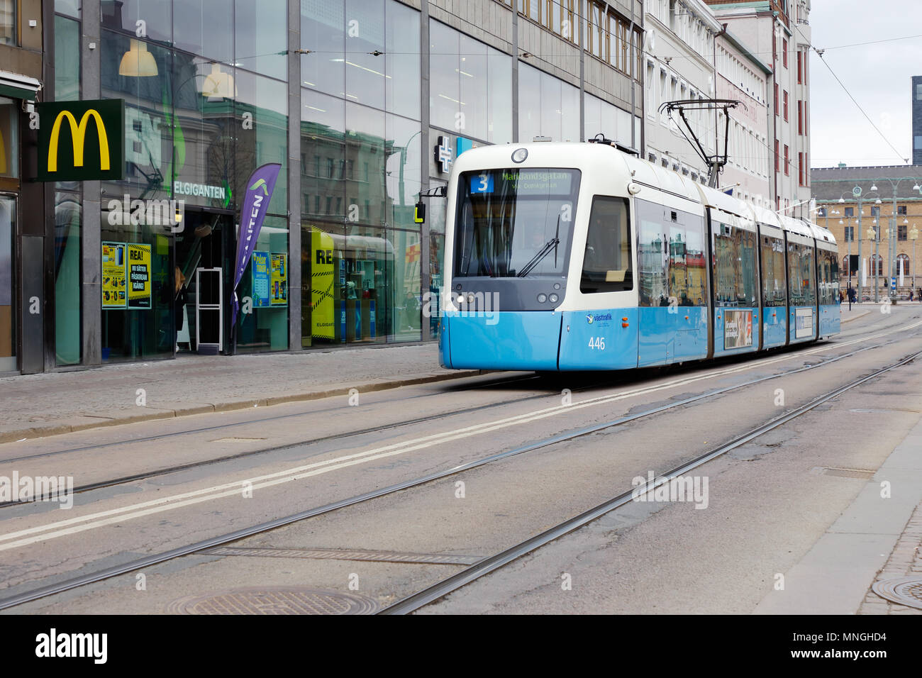 Gohenburg, Sweden - April 16, 2017: Modern articulated  tram of class M32 in service for Vastrafik  on line 3 at street Norra hamngatan. Stock Photo