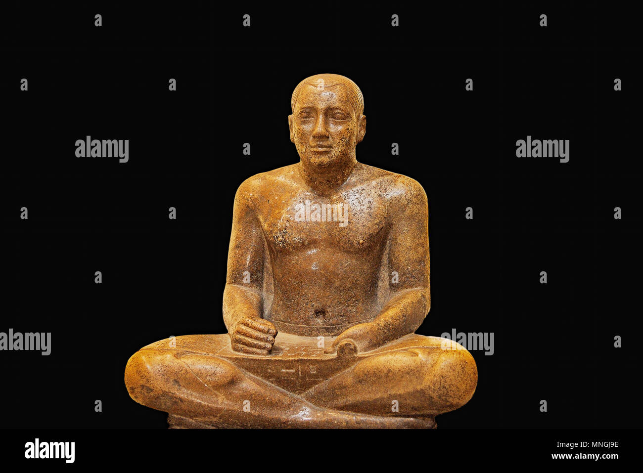 Ancient Egyptian Scribe statue in the Cairo Museum of Antiquities, Cairo, Egypt. Stock Photo