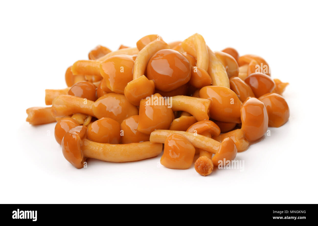 Pile of pickled mushrooms isolated on a white Stock Photo