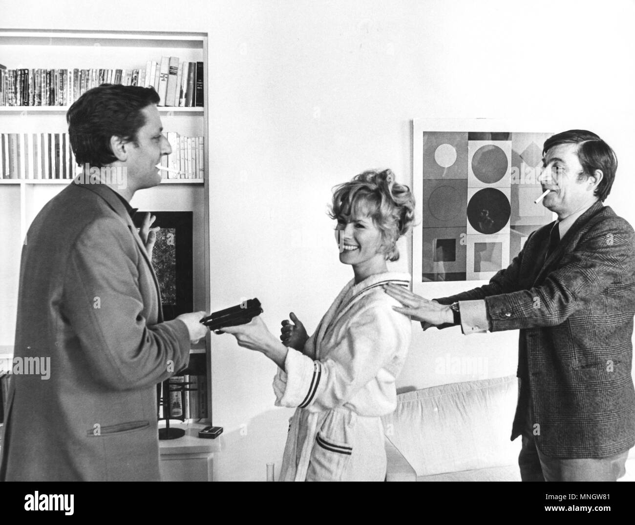 bruno cremer, bibi andersson, jacques doniol-valcroze on set of the movie le viol - overgreppet, 1967 Stock Photo