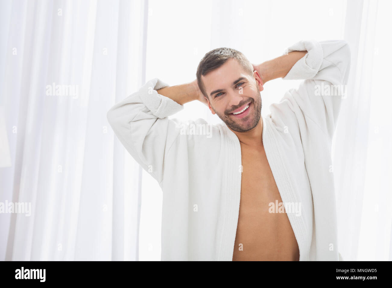 Delighted positive man being in a great mood Stock Photo