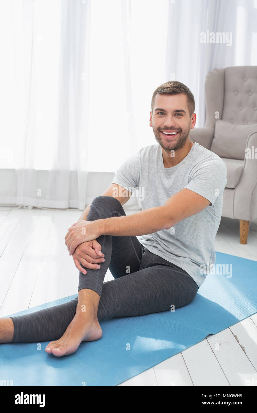 Cheerful positive man smiling Stock Photo