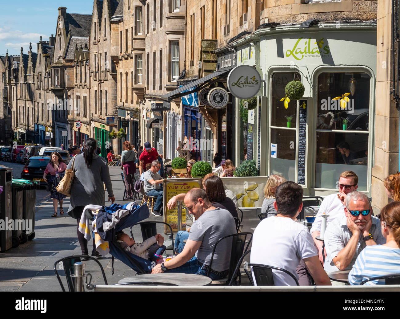 View of shops and cafes  on historic Cockburn Street in Old Town of Edinburgh, Scotland, UK Stock Photo