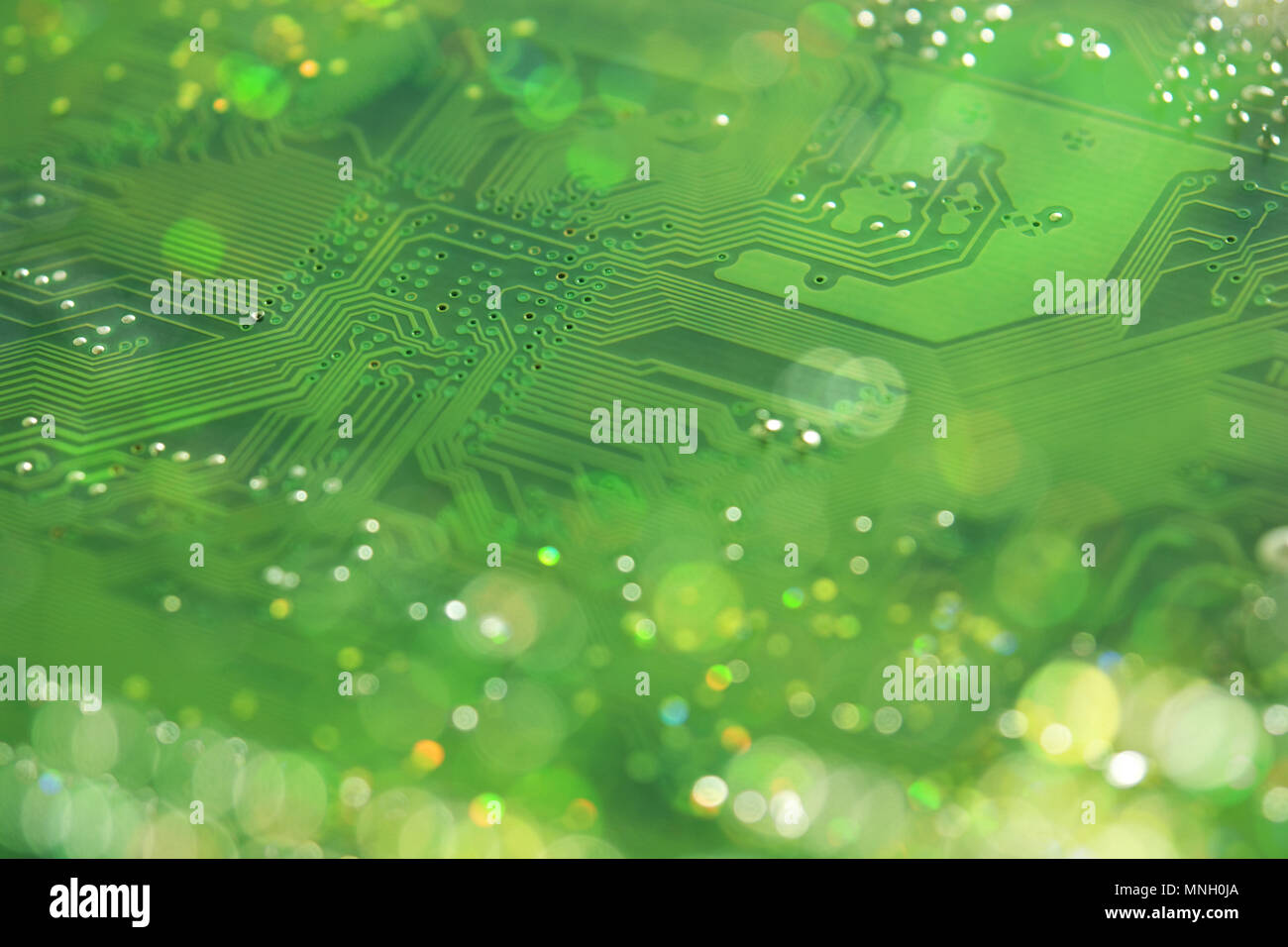 Computer mainboard pathways with soft double exposure bokeh shift Stock Photo