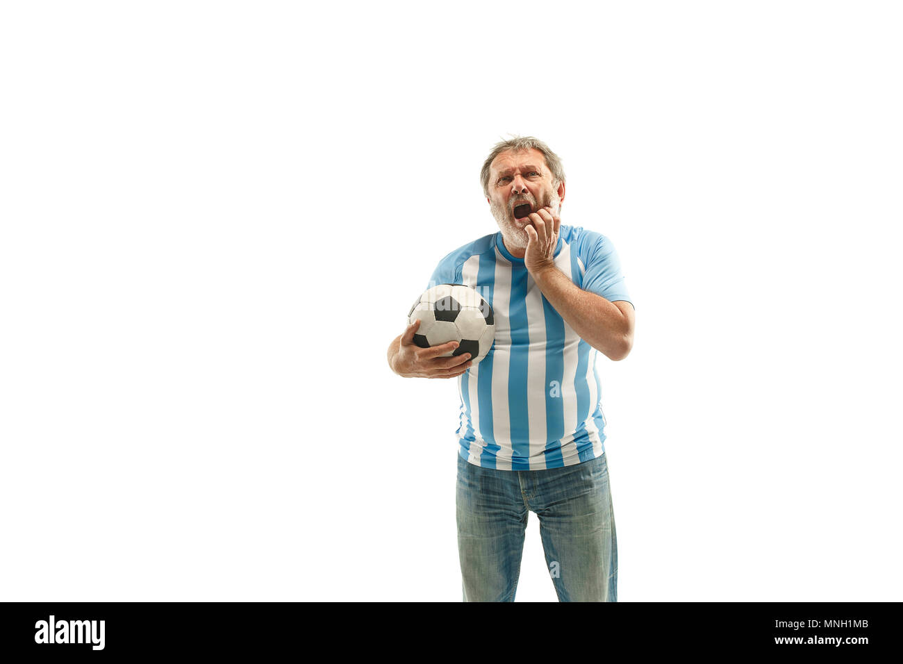 The unhappy and sad Argentinean fan on white background Stock Photo