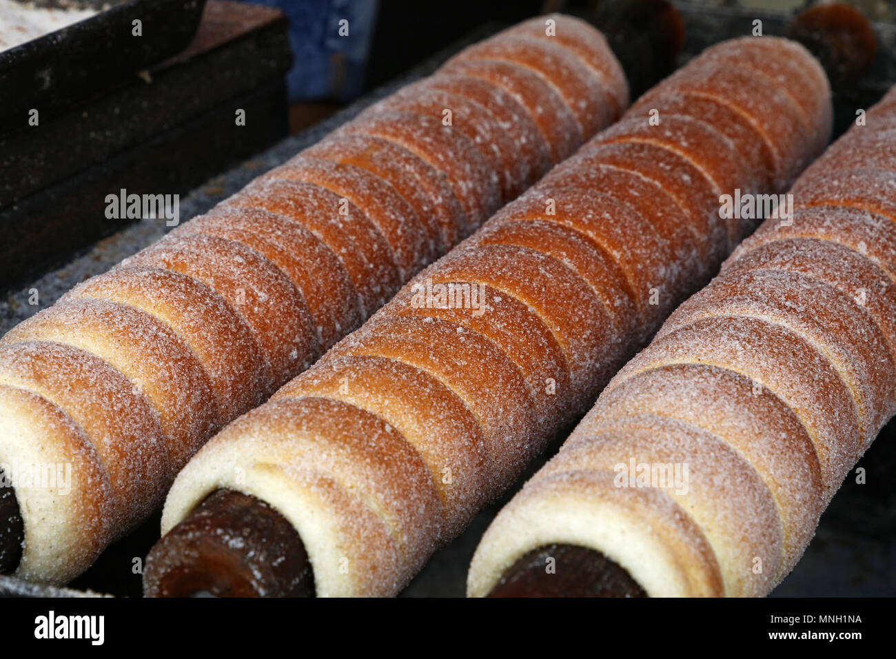 Close up sweet Trdelnik baking on grill, this spit cake is popular in  Europe, Austria, Hungary, Slovakia and Czech, especially in Prague Stock  Photo - Alamy