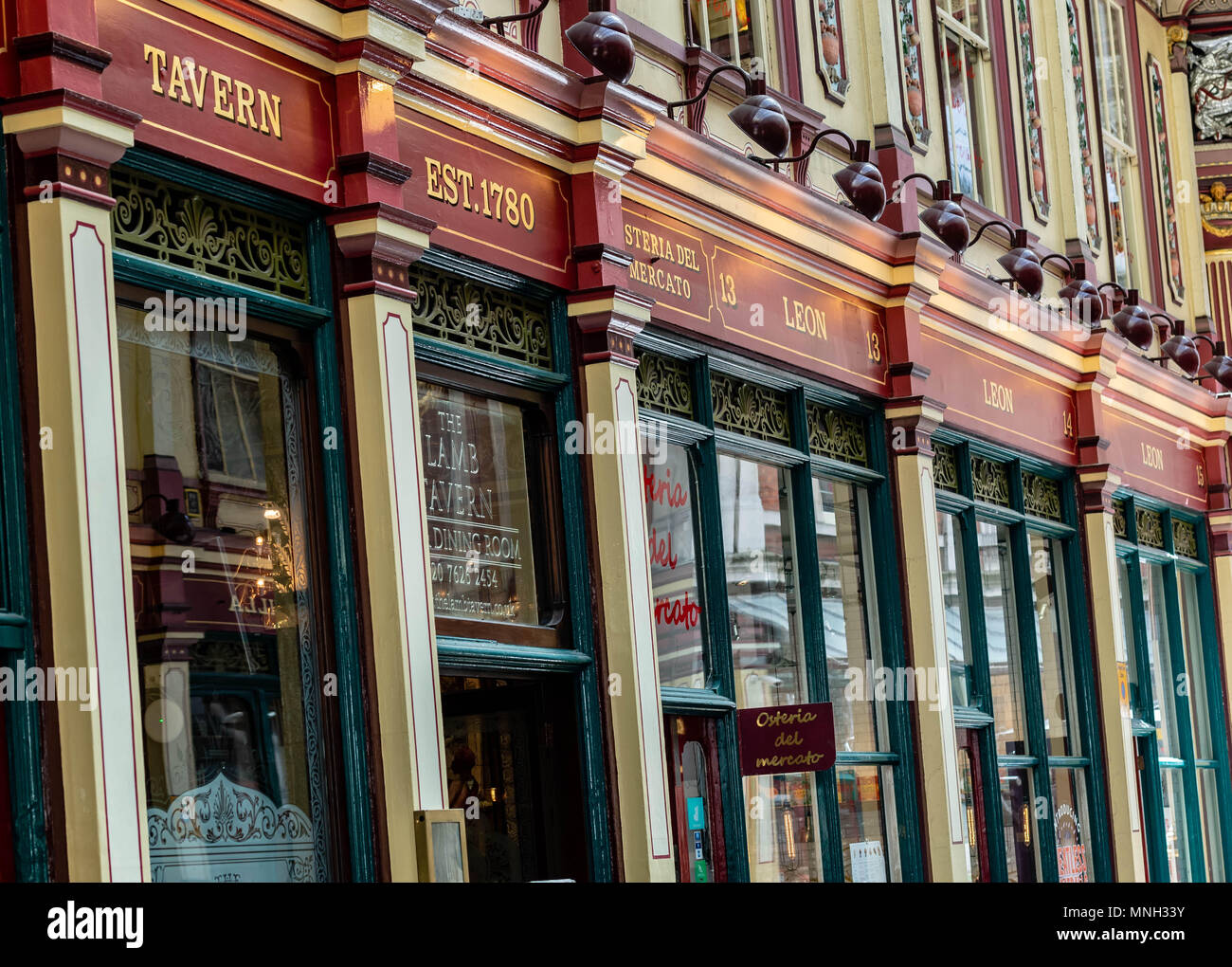 Leadenhall Market is a covered market in London, located on Gracechurch Street  It is one of the oldest markets in London, dating from the 14th century Stock Photo