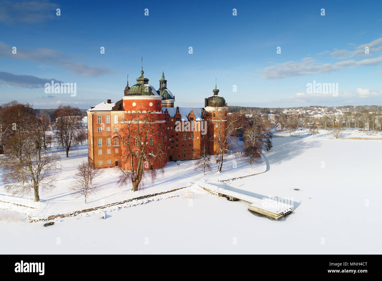 Mariefred, Sweden - Janury 20, 2018: Aerial view of the Gripsholm Castlesurronded by snow during the winter season and located in the town Mariefred,  Stock Photo