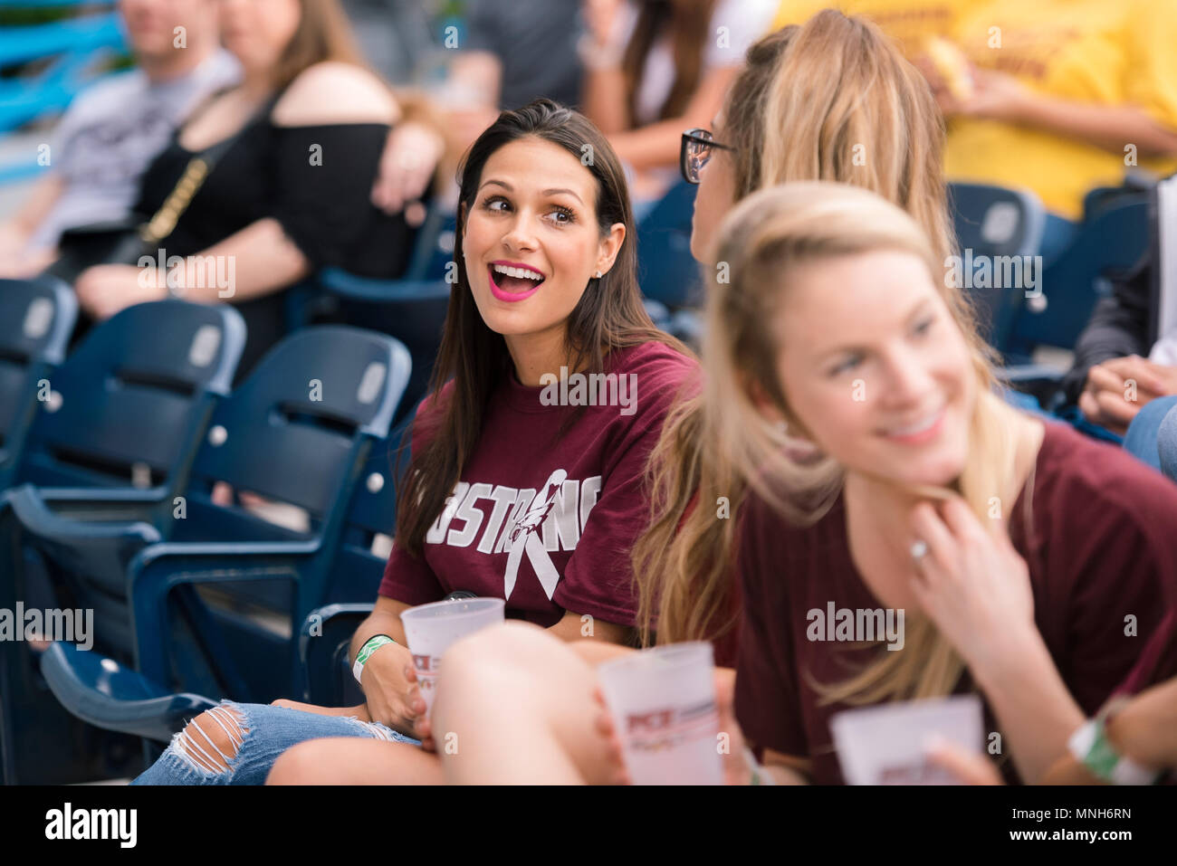 Pompano Beach, Florida, USA. 16th May, 2018. Young ladies seen enjoying the live performance during the Parkland Strong Benefit Concert.South Florida holds benefit concert to raise money for Marjory Stoneman Douglas victim families, and survivors. 3,000 people attended the soldout show, in support of their community. Credit: Emilee Mcgovern/SOPA Images/ZUMA Wire/Alamy Live News Stock Photo