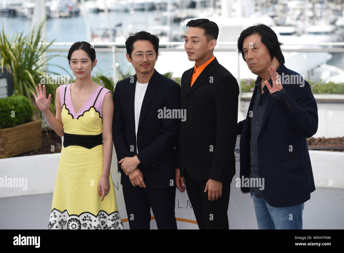 Cannes, France. May 17, 2018 - Cannes, France: Chang-dong Lee, Ah-in Yoo, Steven Yeun, Jong-seo Jeon  attend the 'Burning' photocall during the 71st Cannes film festival. Credit: Idealink Photography/Alamy Live News Stock Photo