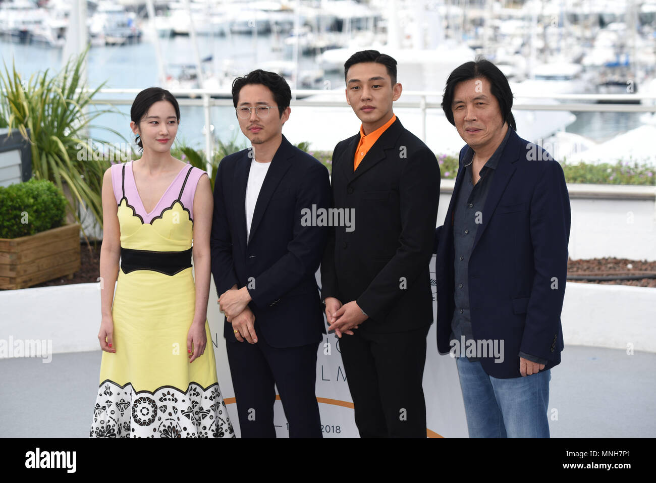 Cannes, France. May 17, 2018 - Cannes, France: Chang-dong Lee, Ah-in Yoo, Steven Yeun, Jong-seo Jeon  attend the 'Burning' photocall during the 71st Cannes film festival. Credit: Idealink Photography/Alamy Live News Stock Photo