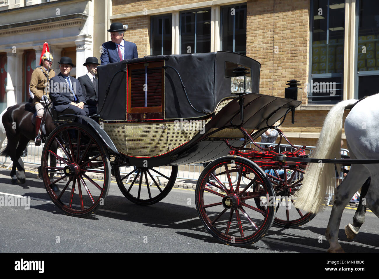 Windsor,UK,17th May 2018,The Royal Wedding Rehearsal in Windsor takes place ahead of the marriage on Saturday of Prince Harry to Meghan Markle. The Ascot Landau carriage left Windsor castle to Process around the Town. The carriage was surrounded by members of the Household Cavalry.Credit Keith Larby/Alamy Live News Stock Photo