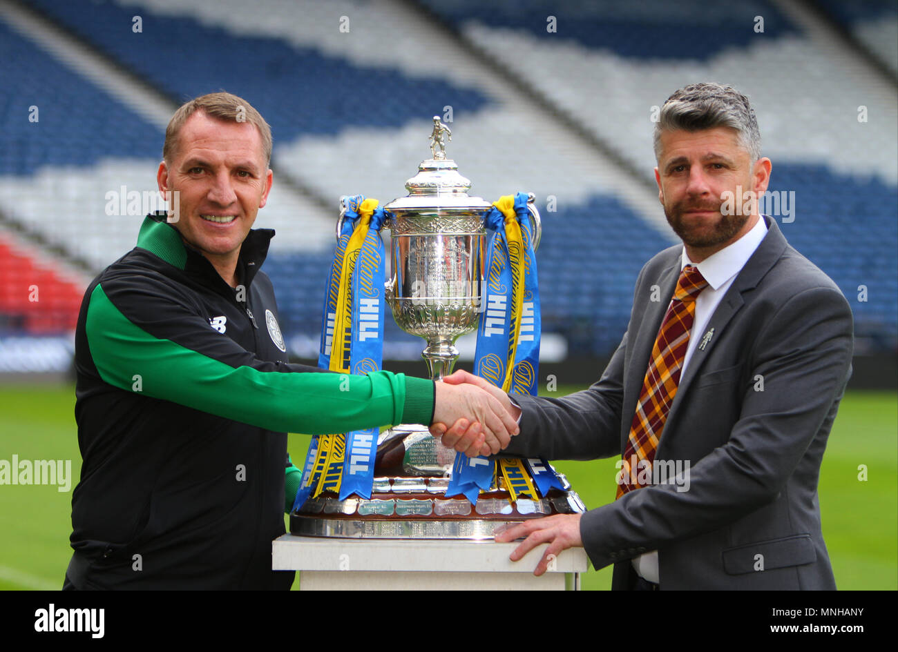 Hampden Park, Glasgow, UK. 17th May, 2018. Scottish Cup Final preview; Brendan Rodgers and Stephen Robinson shake hands as they pose with the Scottish Cup Credit: Action Plus Sports/Alamy Live News Stock Photo