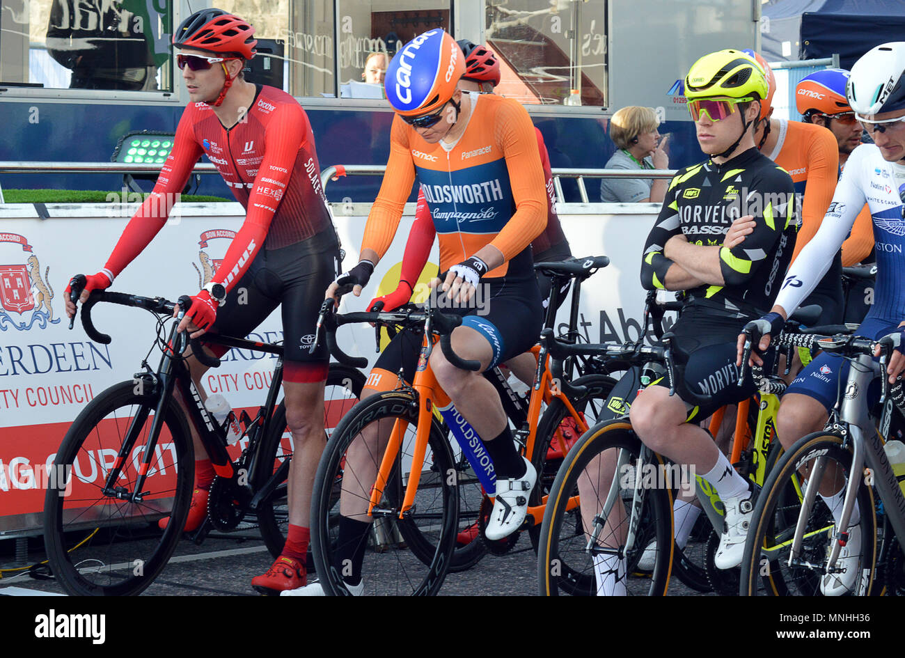 ABERDEEN, SCOTLAND - 17 MAY 2018: Some seem totally relaxed, others total concentration, riders at the start of the Tour Series cycle race on Union Street Credit: Douglas MacKenzie/Alamy Live News Stock Photo