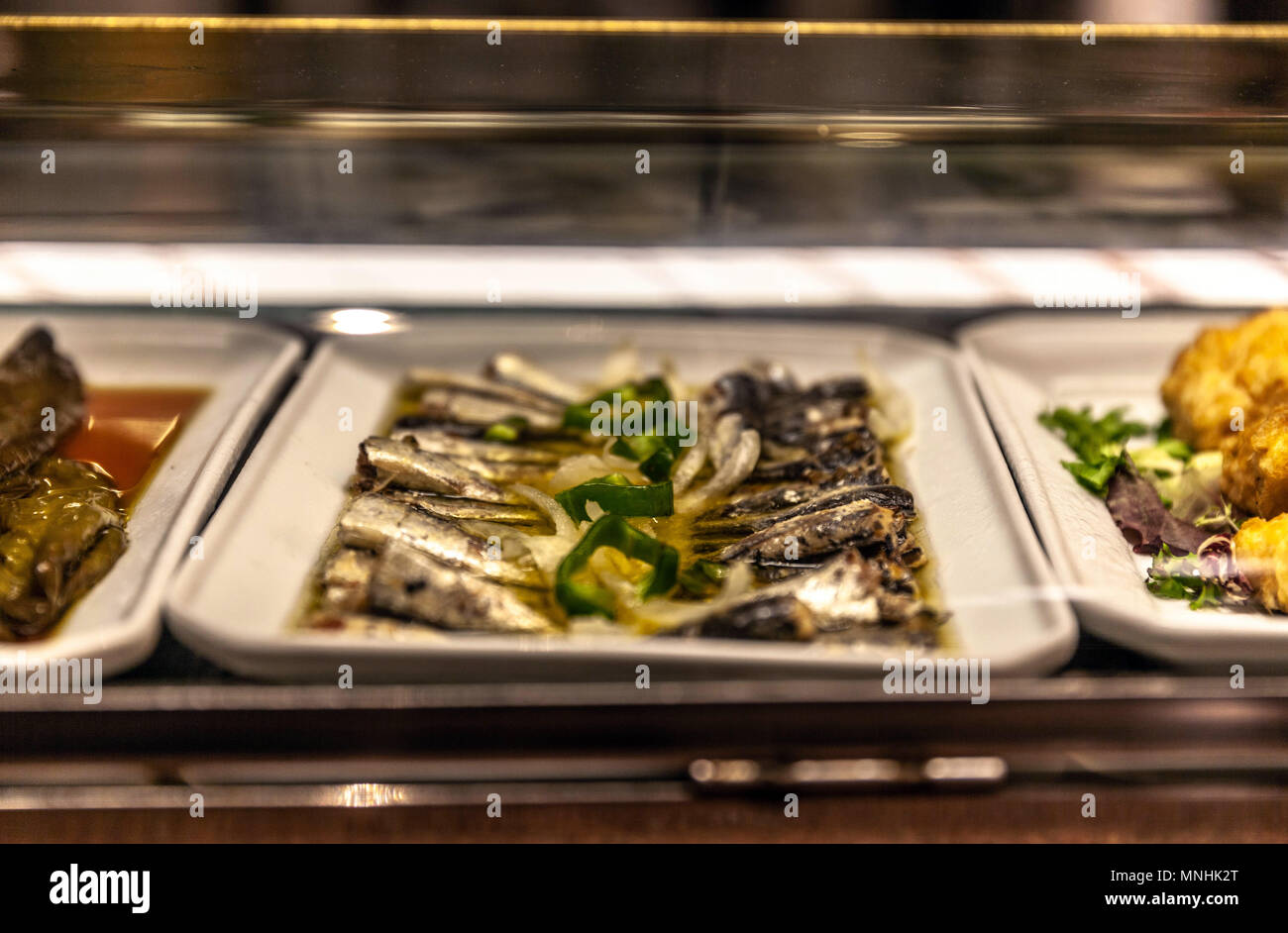 Boquerones en vinagre ready for serving as Hors d'oeuvre Madrid, Spain. Stock Photo