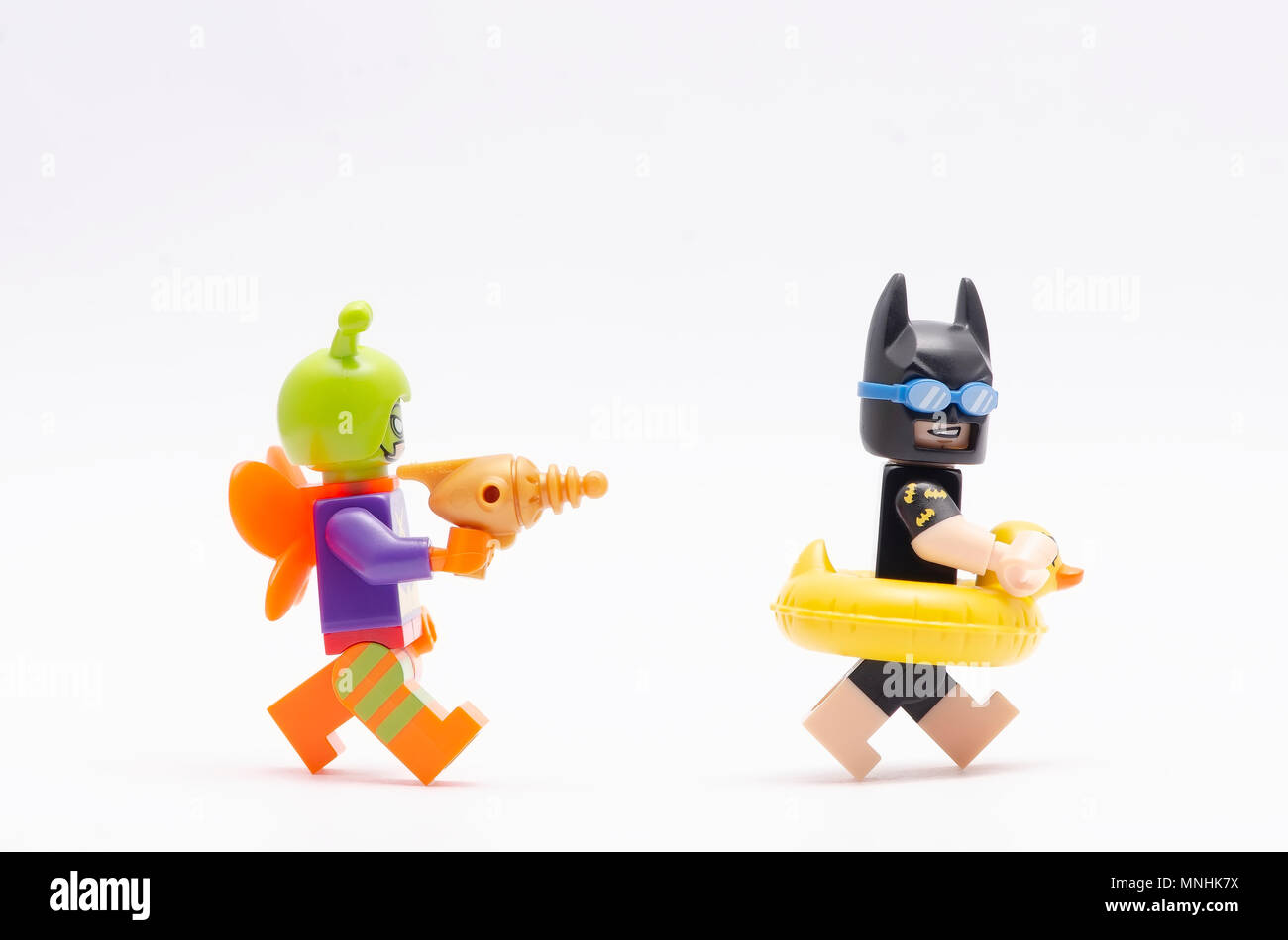 mini figure of killer moth chasing batman. Lego minifigures are  manufactured by The Lego Group Stock Photo - Alamy