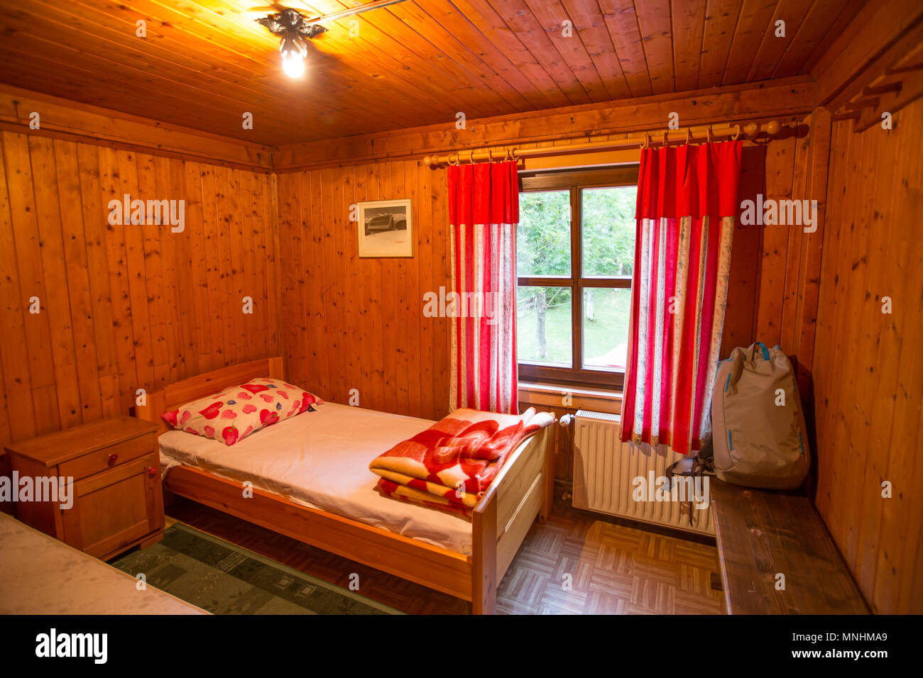 Basic room at mountain hut at Uskovnica pasture at Pokljuka Plateau, forested karst plateau Uskovnica, Triglav, Slovenia Stock Photo