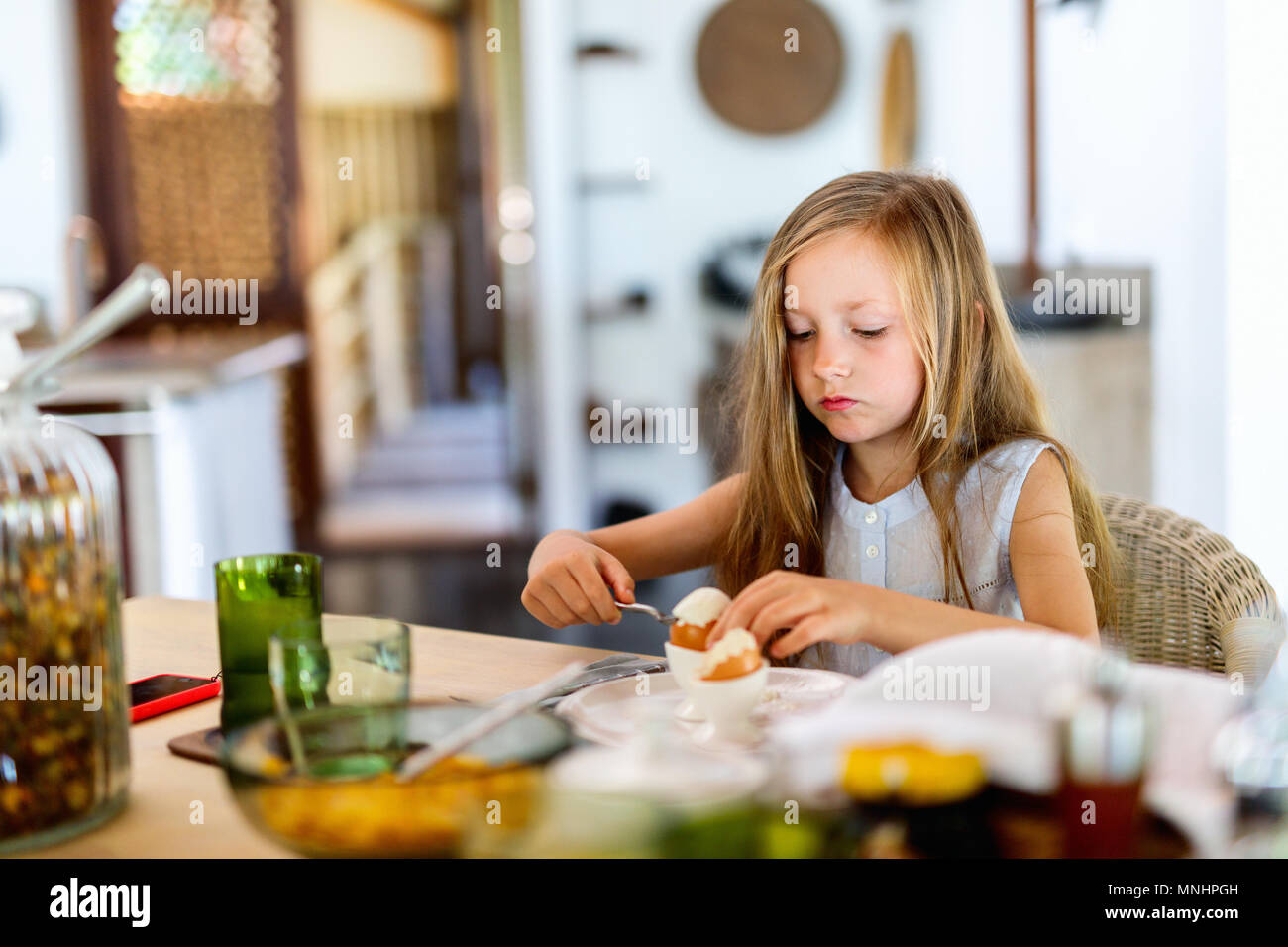 Child eating egg hires stock photography and images Alamy