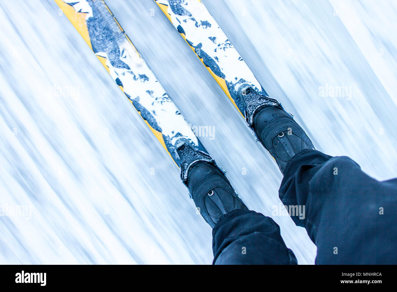 Directly above view of skis of skier sliding on snow, Missoula, Montana, USA Stock Photo