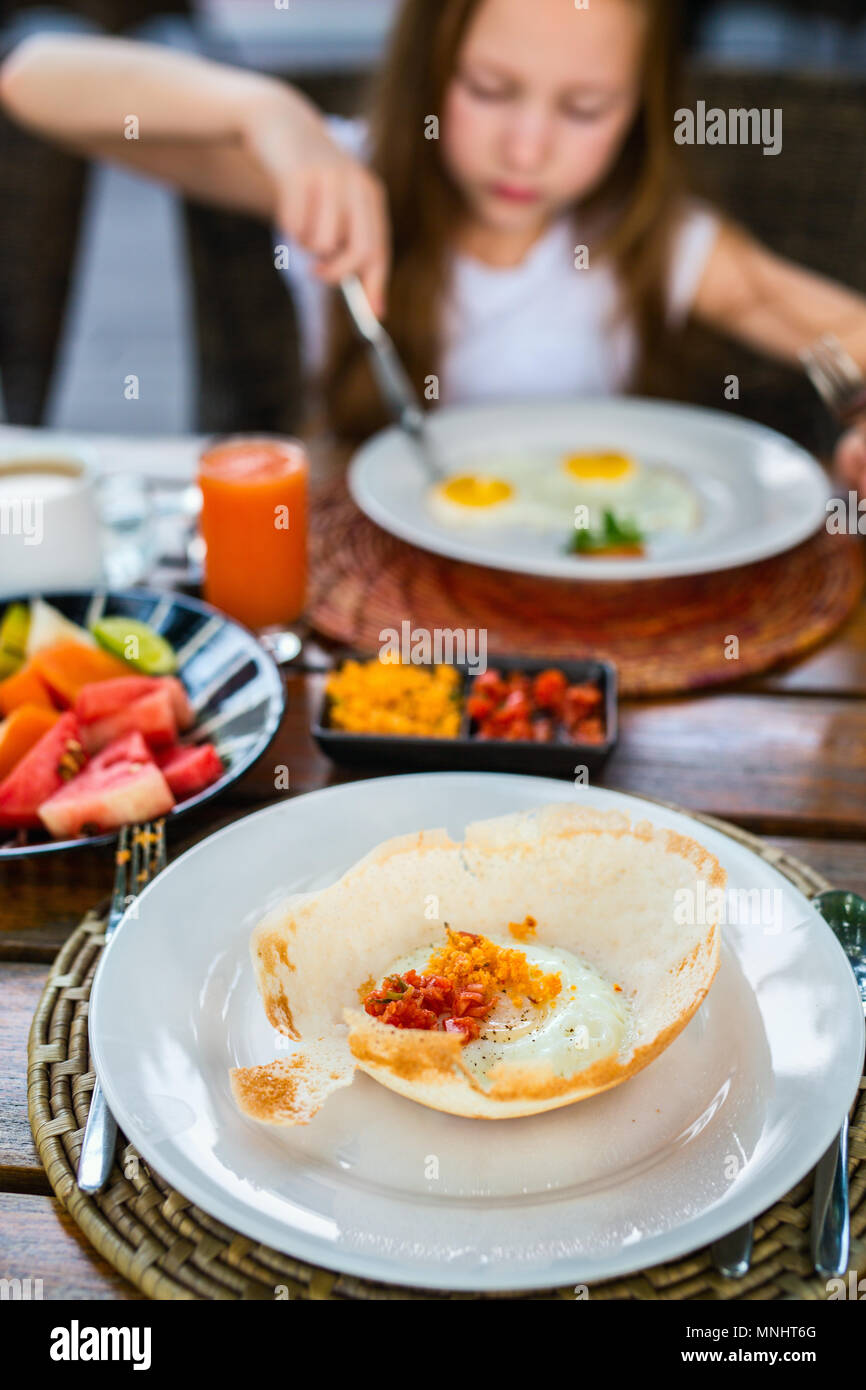 Traditional Sri Lankan breakfast with egg hoppers Stock Photo