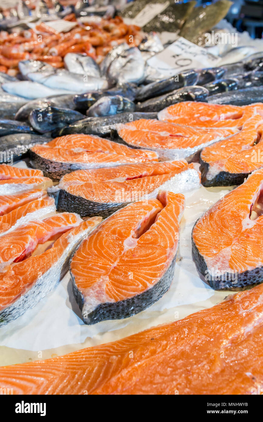 Fresh salmon steaks on ice for sale at italian fish market Stock Photo