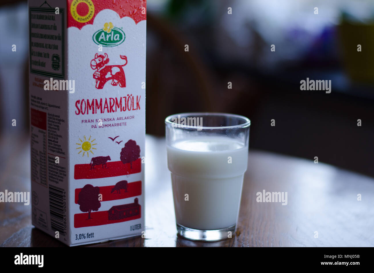 Stockholm, Sweden - 12 may 2018. A carton of milk and a glass of Arlas new milk 'Sommarmjölk', made to give the farmers more money for their productio Stock Photo