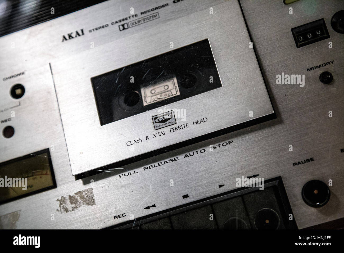 Closeup of a retro brushed silver Akai cassette tape recorder Stock