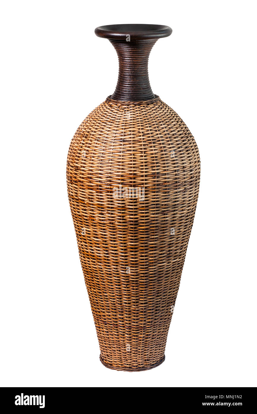 Ceramic vase in braided rattan isolated on white. Clipping path Stock