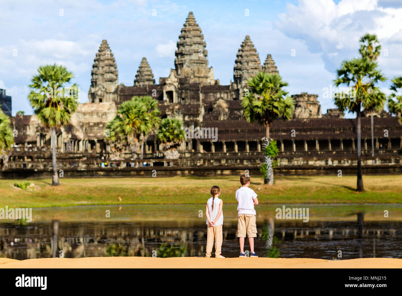 Kids at ancient Angkor Wat temple in Siem Reap in Cambodia Stock Photo