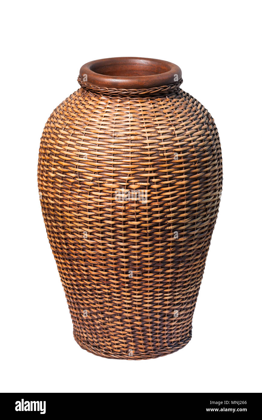 Ceramic vase in braided rattan isolated on white. Clipping path Stock