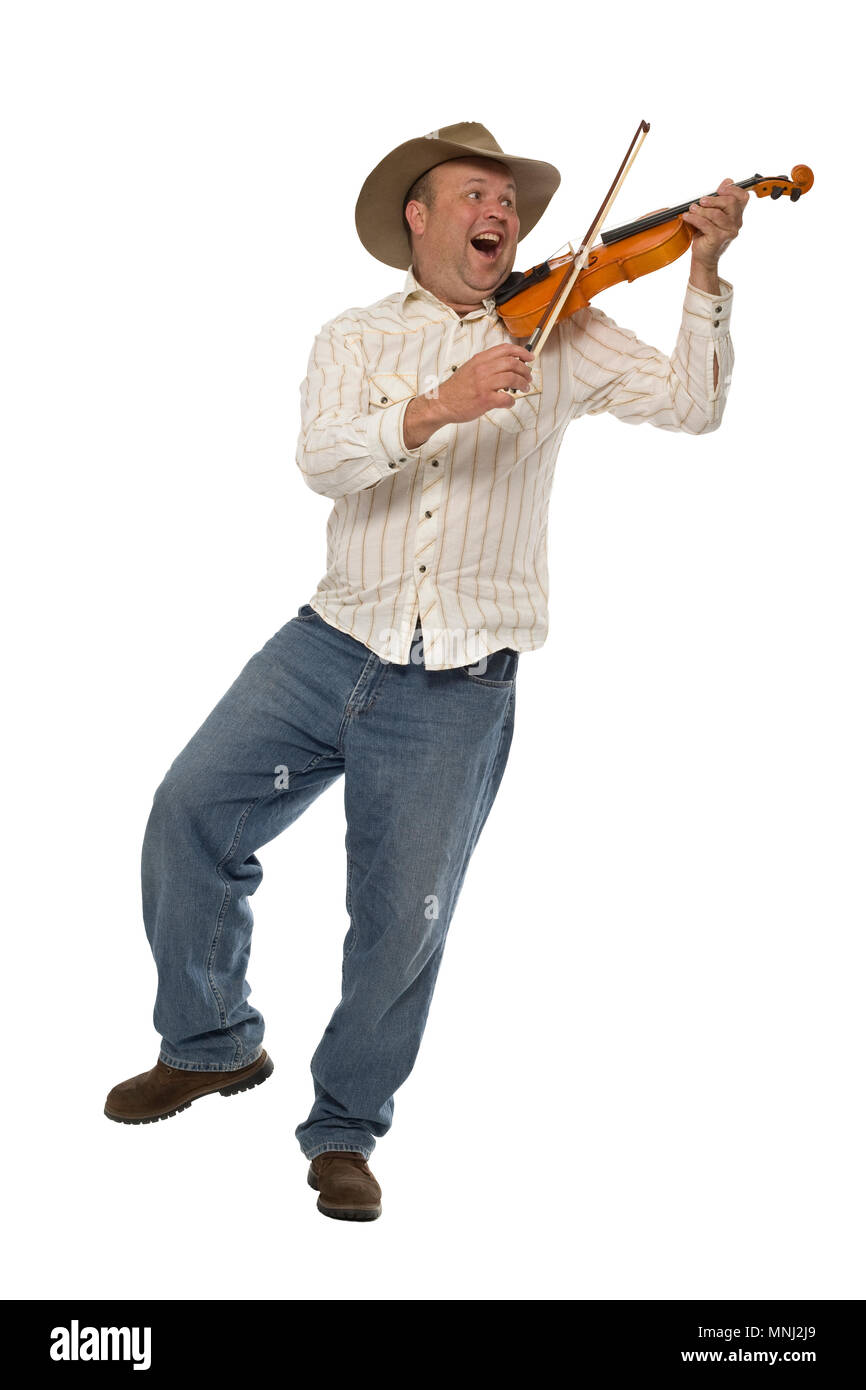 A full length image of a man playing the fiddle. Stock Photo