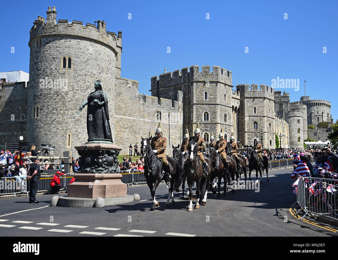 Members of the armed forces during a parade rehearsal in Windsor, Berkshire ahead of the wedding of Prince Harry and Meghan Markle this weekend. Stock Photo