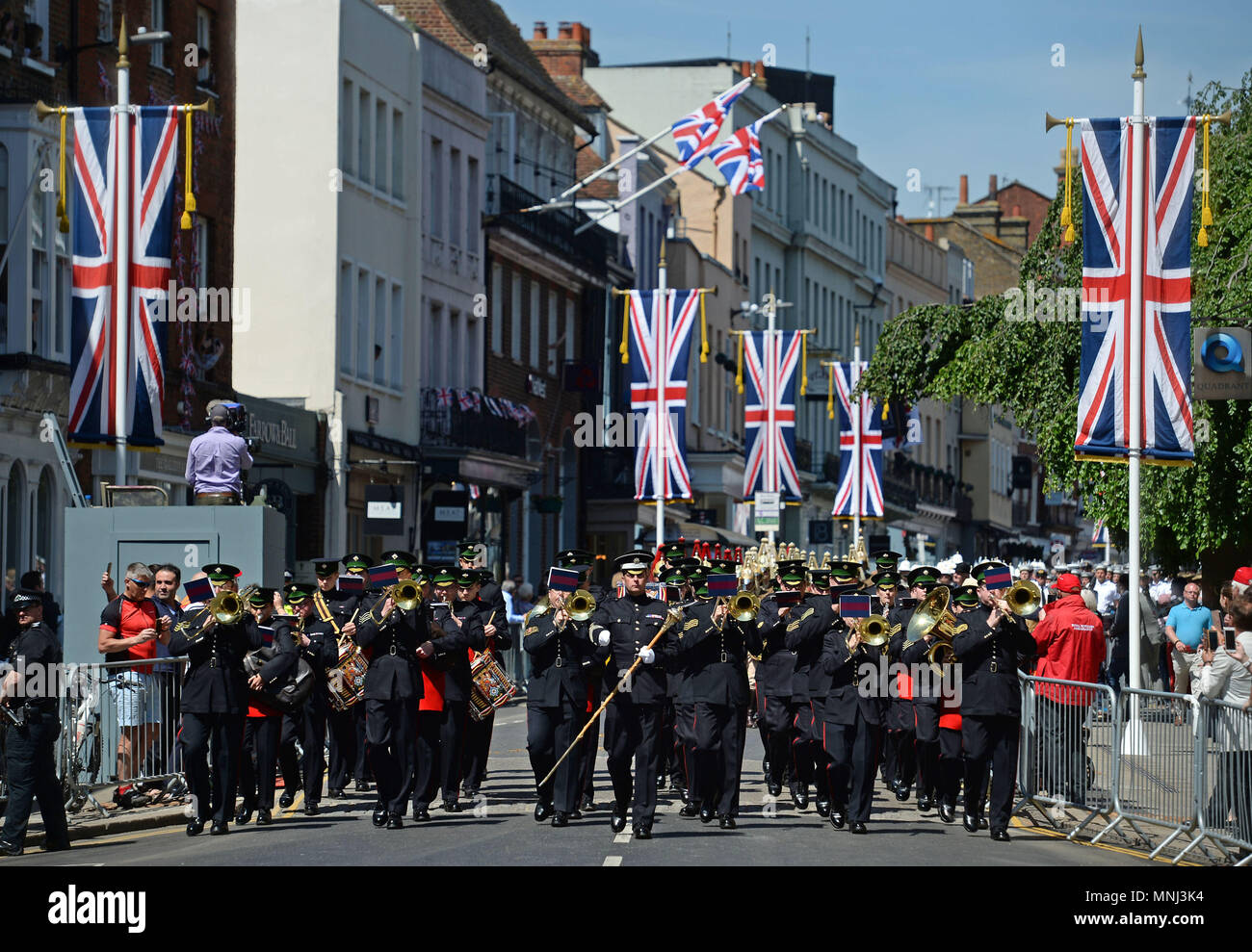 Members of the armed forces during a parade rehearsal in Windsor, Berkshire ahead of the wedding of Prince Harry and Meghan Markle this weekend. Stock Photo