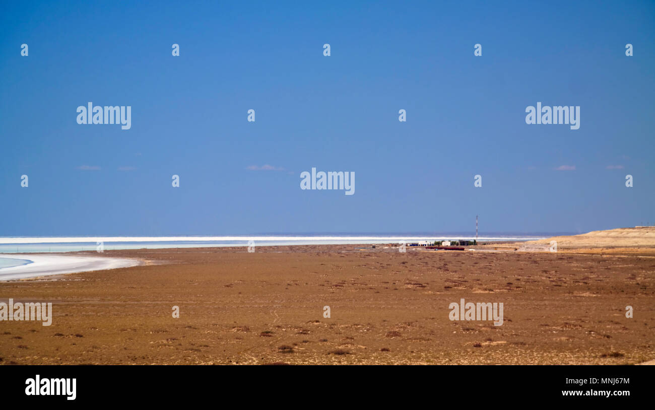 Panorama view to saline Barsa Kelmes lake and Ustyurt plateau at Karakalpakstan, Uzbekistan Stock Photo