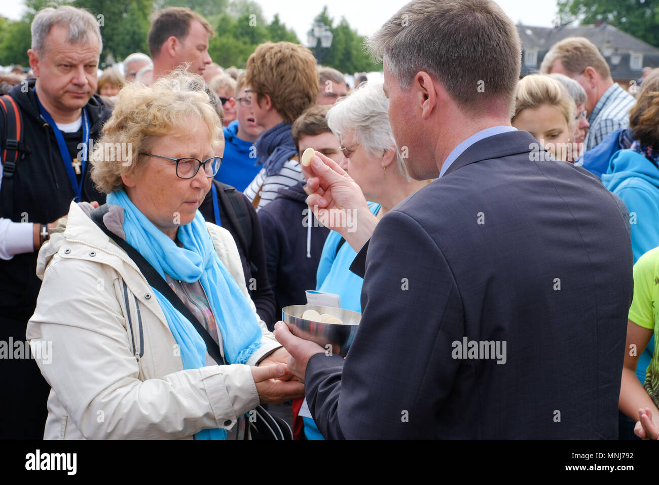 Sacrament of the Last Supper (Eucharist) during the open air closing service at the 101th German Catholic Church Congress on May 13th 2018 in Muenster, Germany Stock Photo